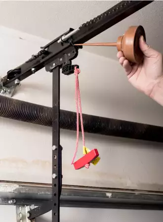 garage-door-maintenance Lubrication services for smooth garage door operation