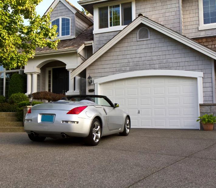 garage-door-services Certified technician performing garage door repairs.